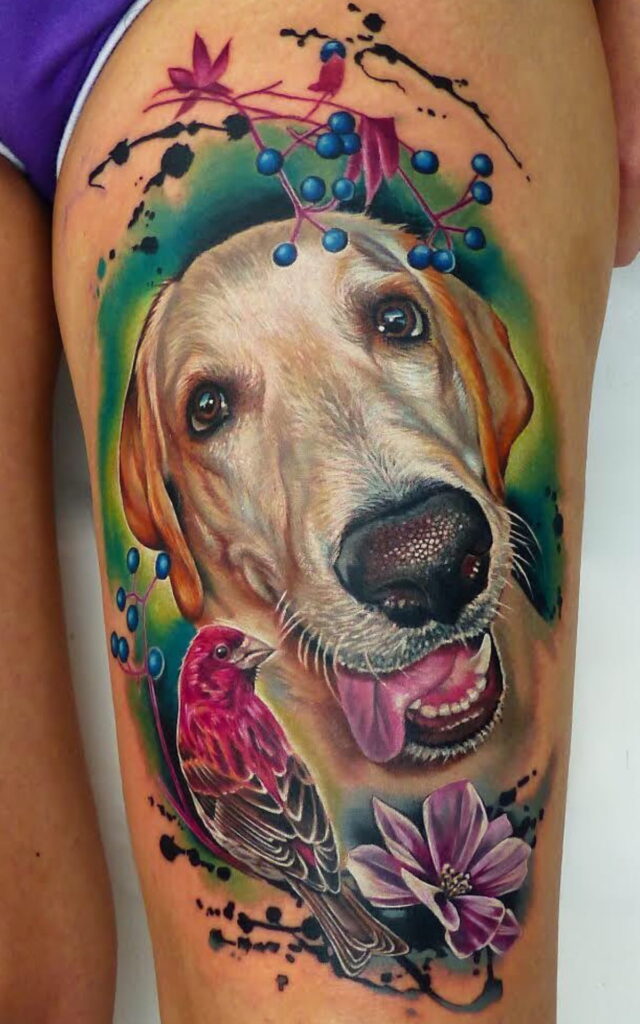 Realistic color tattoo of a dog and a bird surrounded by flowers by Laura Egea