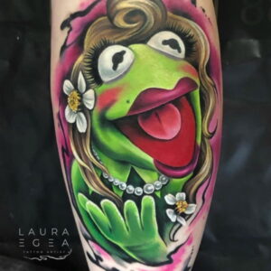 color realism tattoo of iconic cartoon portrait created by international tattoo artist Laura Egea based in Texas USA