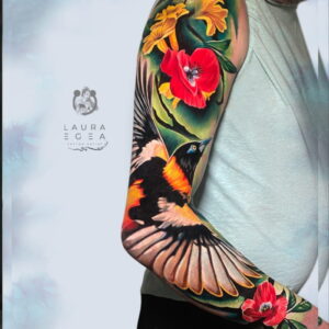 Color realism tattoo sleeve with a natural bird and floral composition by Laura Egea in Dallas Texas