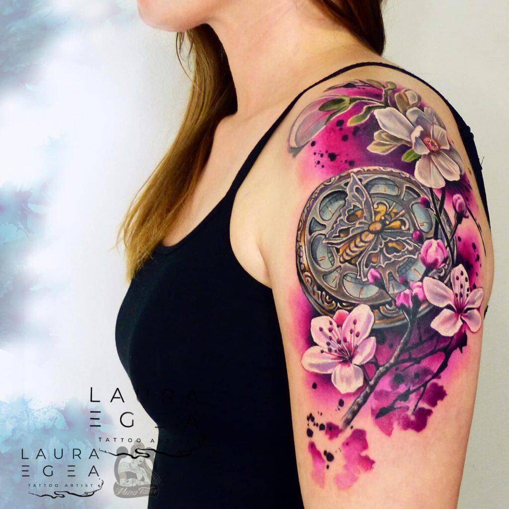 Feminine color clockwork tattoo by Laura Egea Texas USA