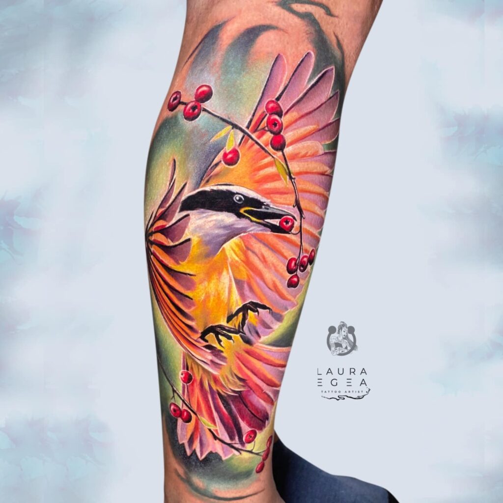 color realism bird tattoo in natural forest setting by Laura Egea Dallas Texas
