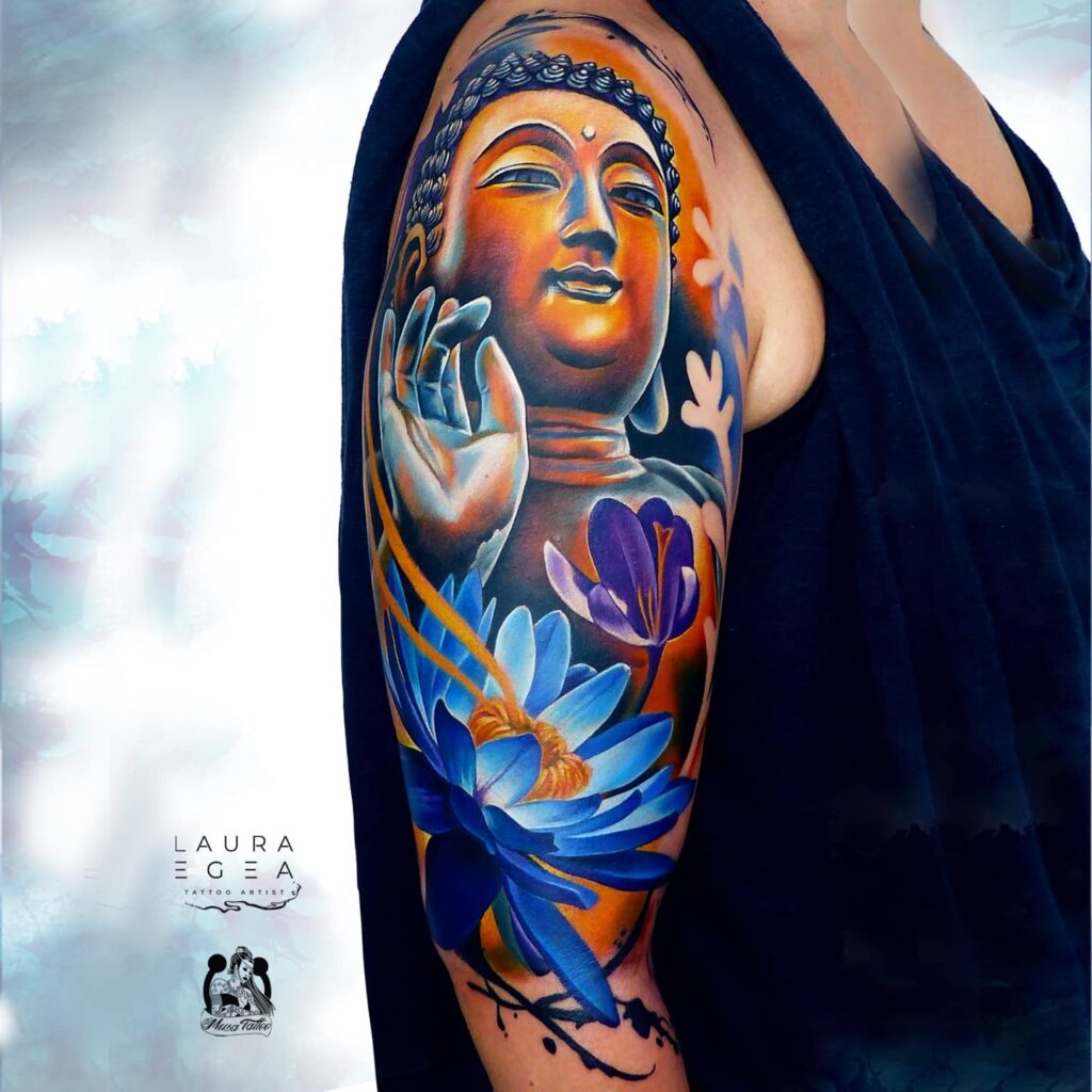 Buddha portrait tattoo with floral composition by Laura Egea Dallas Texas