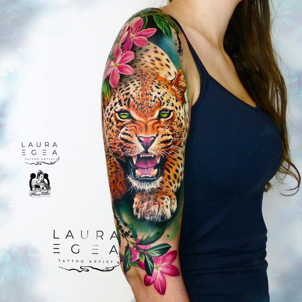 Fantasy leopard tattoo with flowers and leaves tattoo by Laura Egea Dallas Texas
