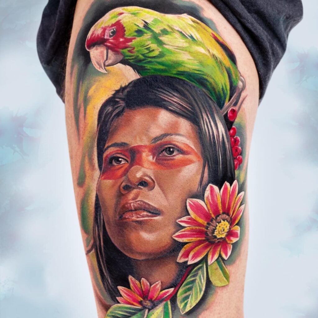 Indigenous female portrait tattoo with parrot by Laura Egea Dallas Texas